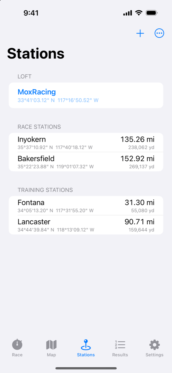 Stations screen listing the loft and race and training stations with their coordinates and distances
